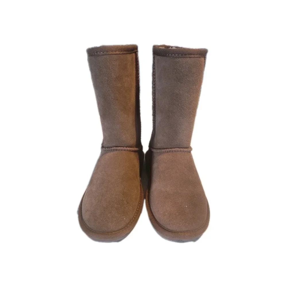 Minnetonka Olympia Short Sheepskin Leather Boots | Women's 6m